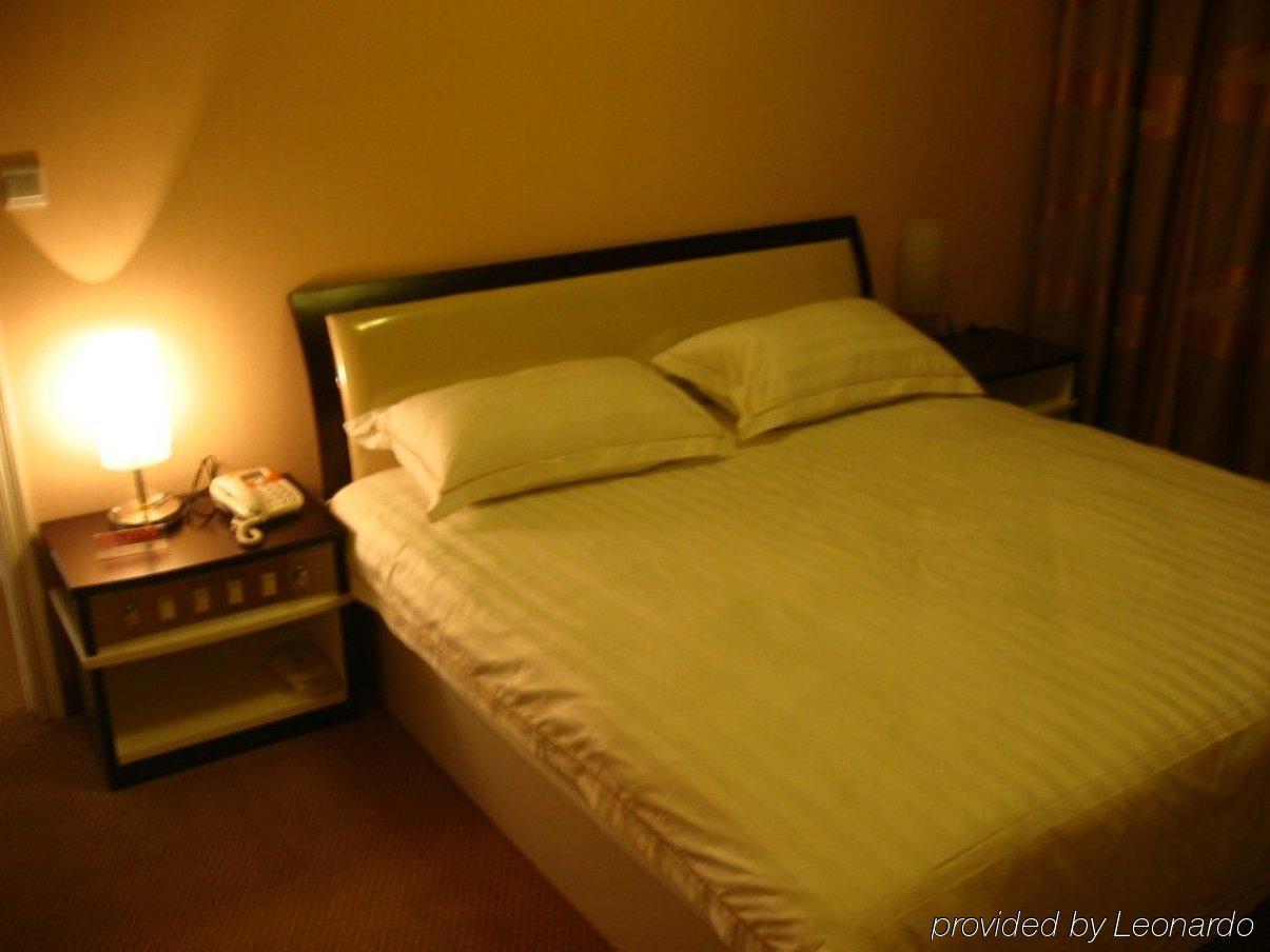Jiujiu Holiday Hotel Shanghai Camera foto