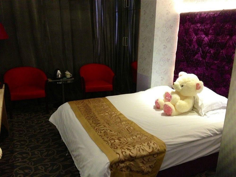 Jiujiu Holiday Hotel Shanghai Esterno foto