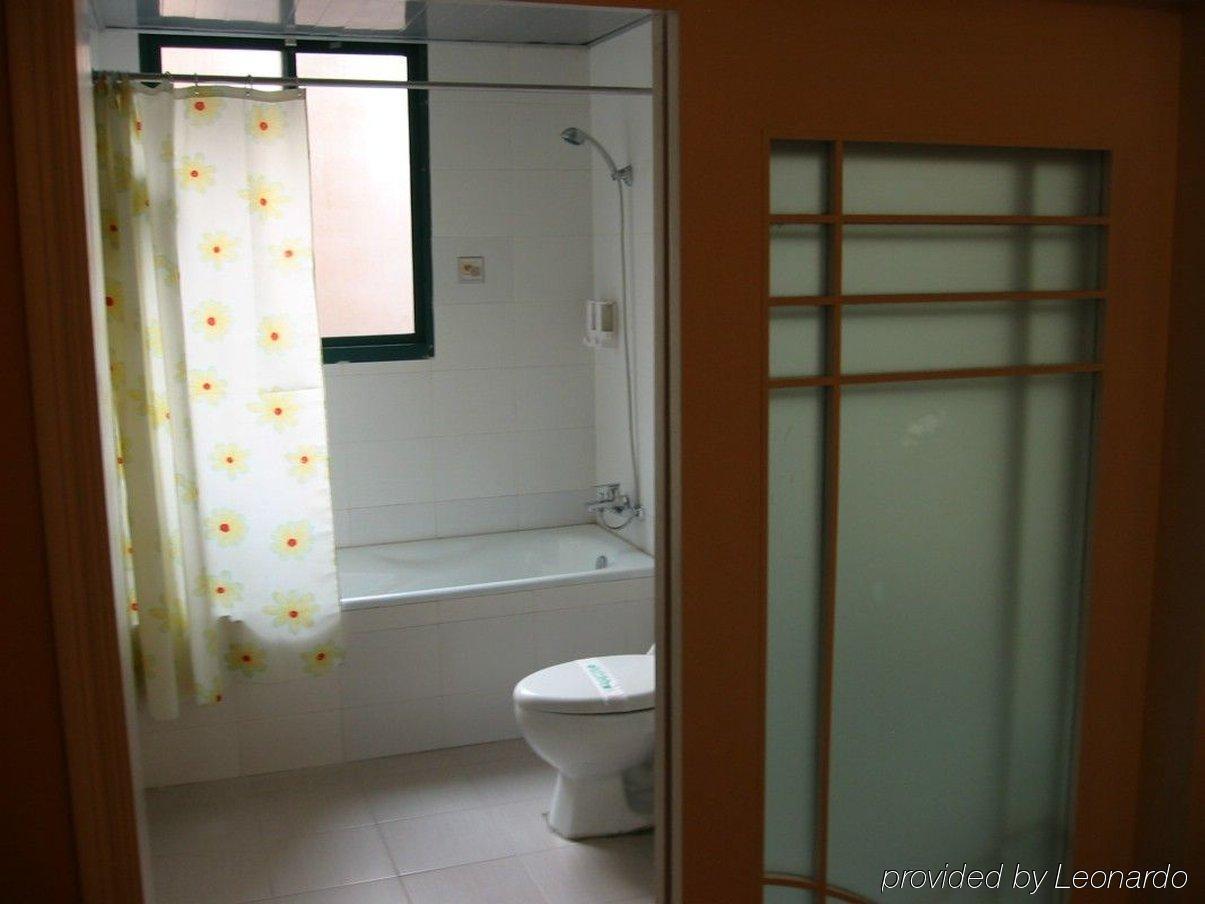 Jiujiu Holiday Hotel Shanghai Camera foto