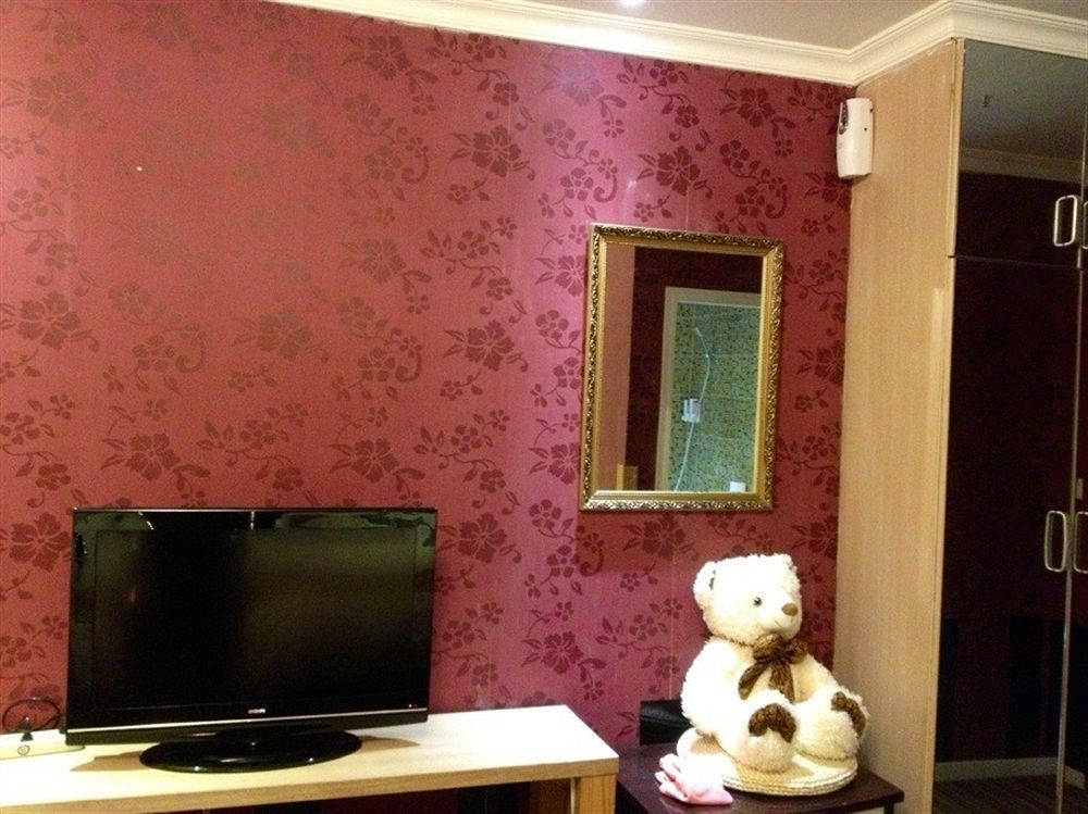 Jiujiu Holiday Hotel Shanghai Esterno foto