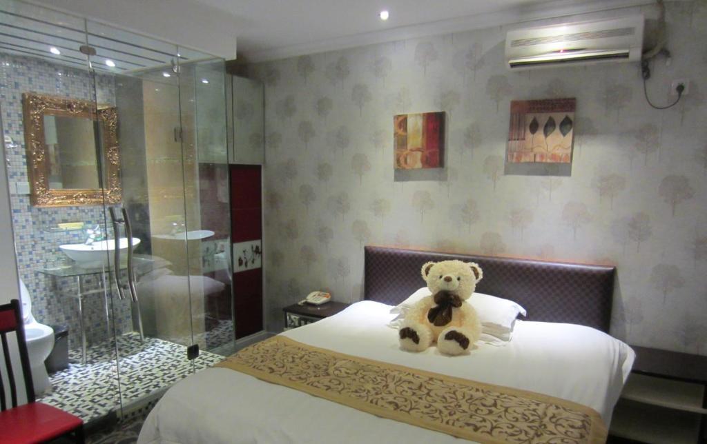 Jiujiu Holiday Hotel Shanghai Camera foto