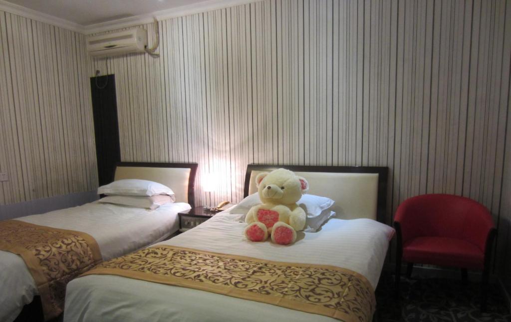 Jiujiu Holiday Hotel Shanghai Camera foto