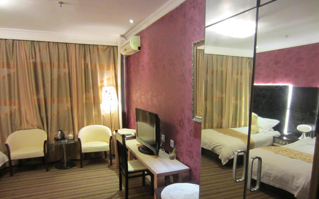 Jiujiu Holiday Hotel Shanghai Camera foto