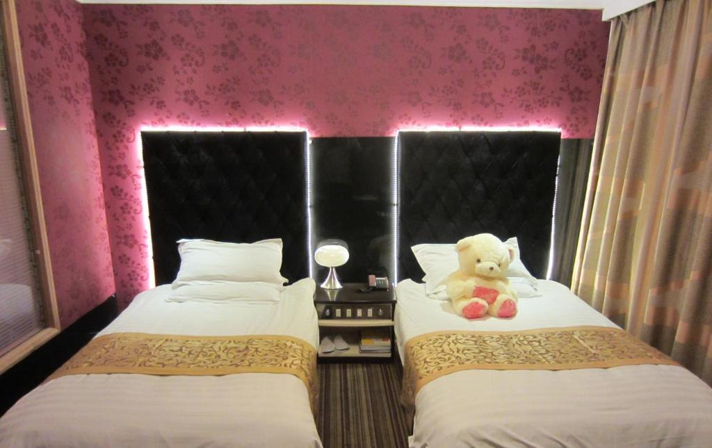 Jiujiu Holiday Hotel Shanghai Camera foto