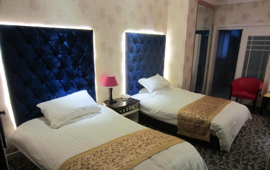 Jiujiu Holiday Hotel Shanghai Camera foto